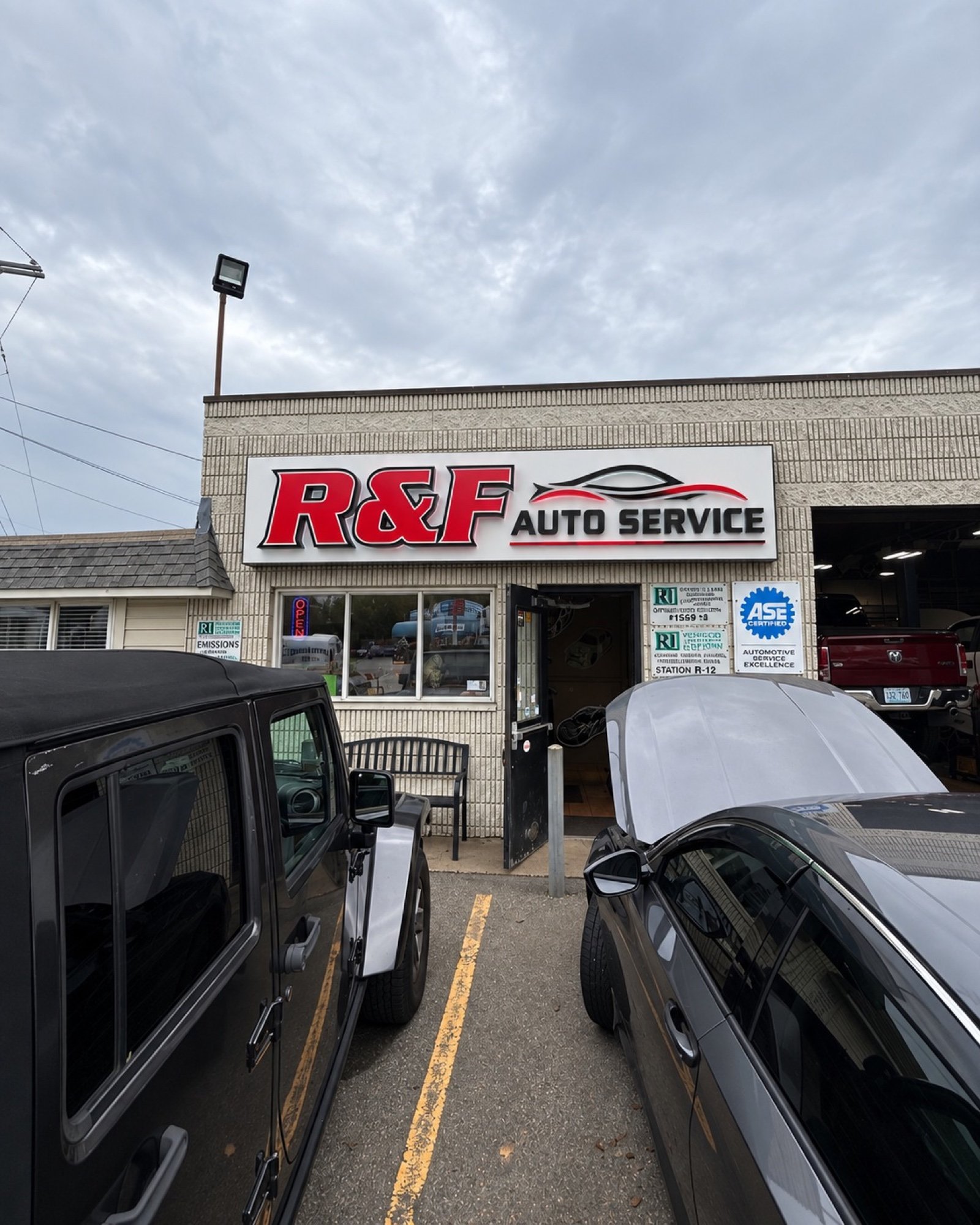 Daytime concept of the R&F sign on a white background